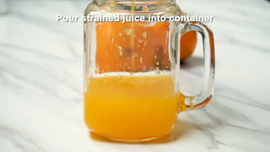 pour strained juice into container